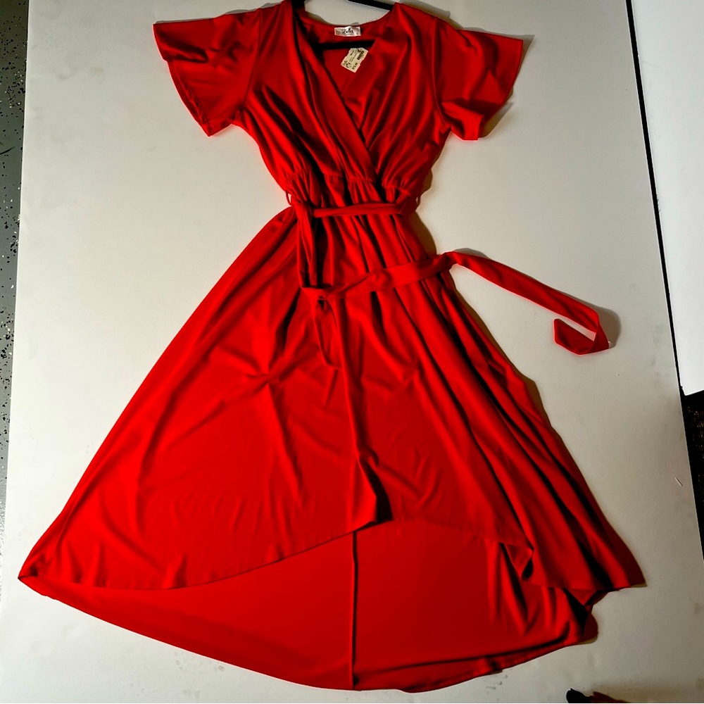New with tags, reddish orange Hilow dress.